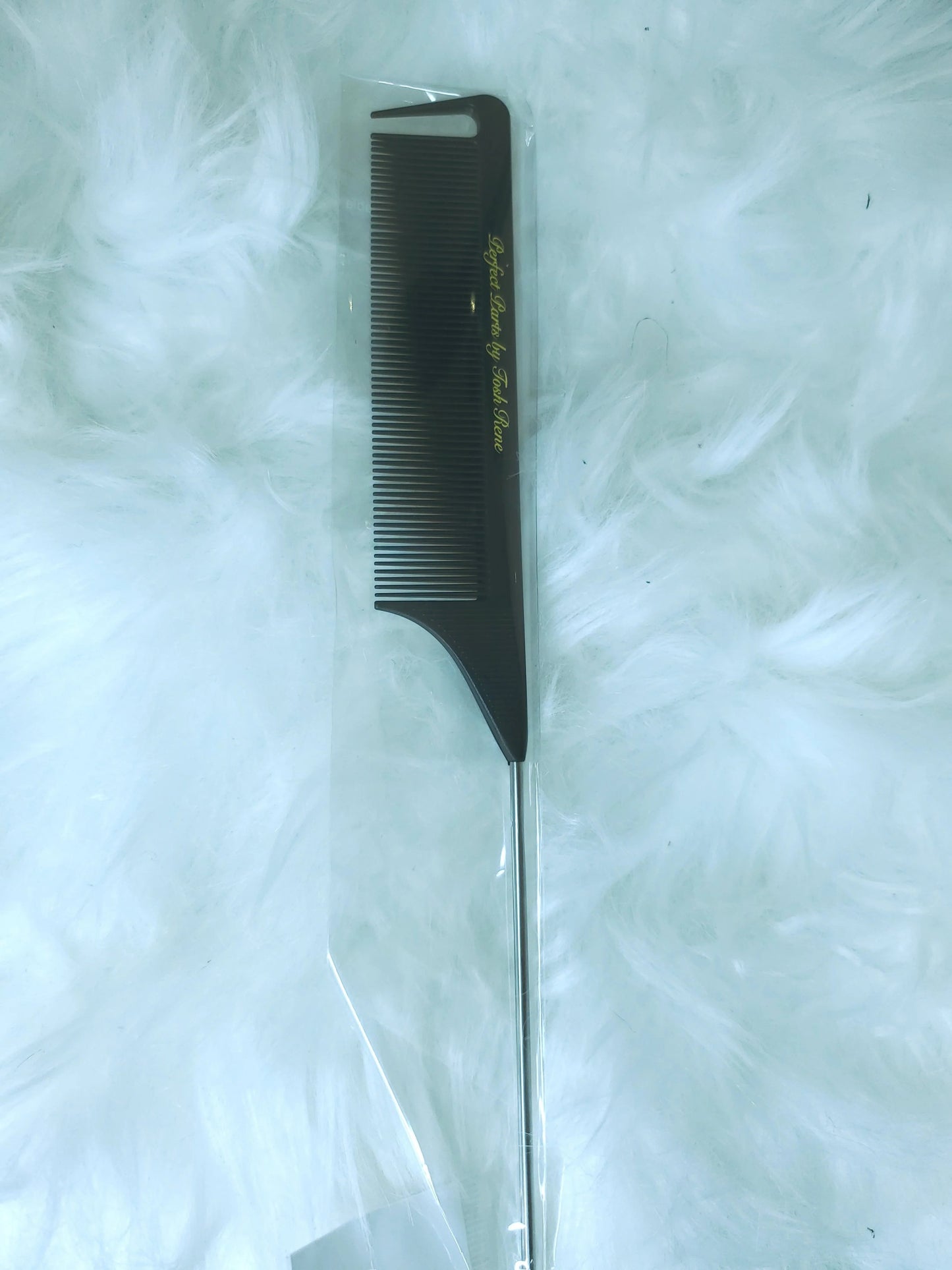 If you are having a hard time getting your parts straight, or want to remove braids at a faster pace... This is the perfect comb for you!
1. The pintail of the comb is great for removing braids easier and creating parts.
2. The top of the comb, where the gap is, helps clean up the parts you already made with the pintail.
3. The fine teeth on the comb are great for perfecting slik presses and removing tangles that you may have missed when detangling.